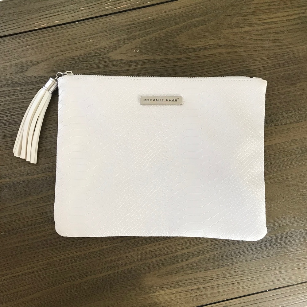 Brandy new RODAN AND FIELDS clutch